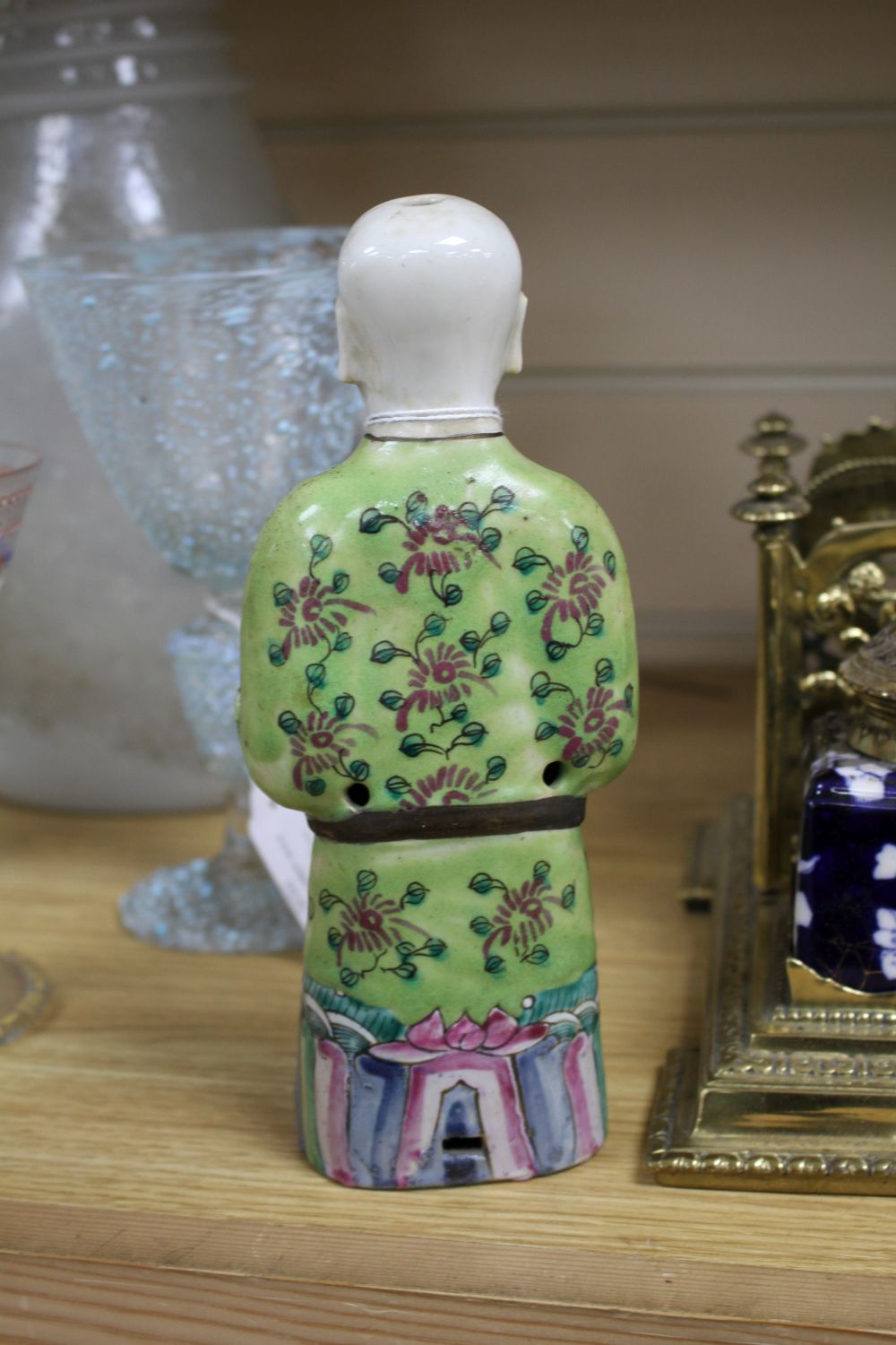 A near pair of Chinese polychrome-decorated figural incense burners and another similar incense burner, Jiaqing period (1796-1820)